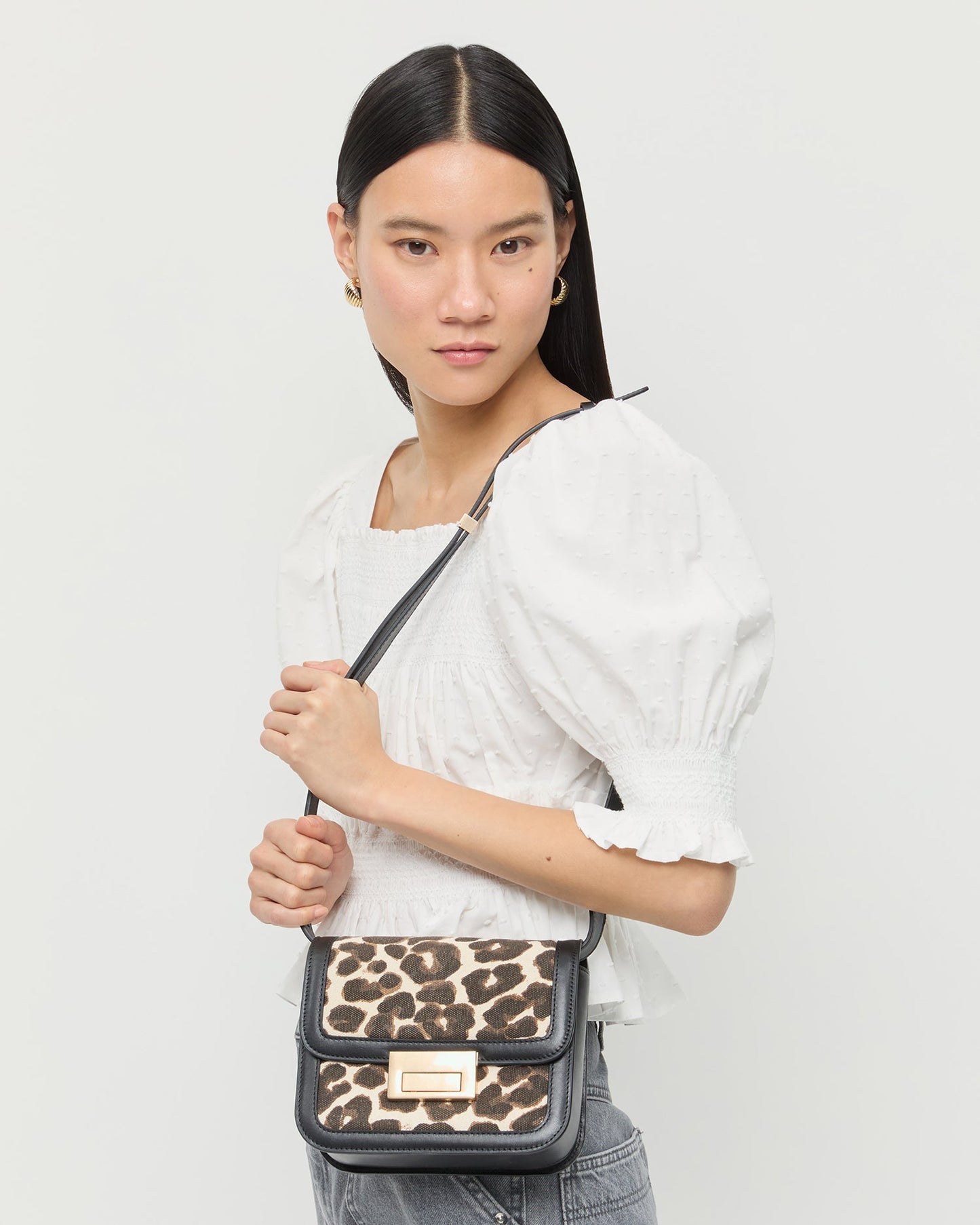Sac bandoulière Desi en toile léopard/noir