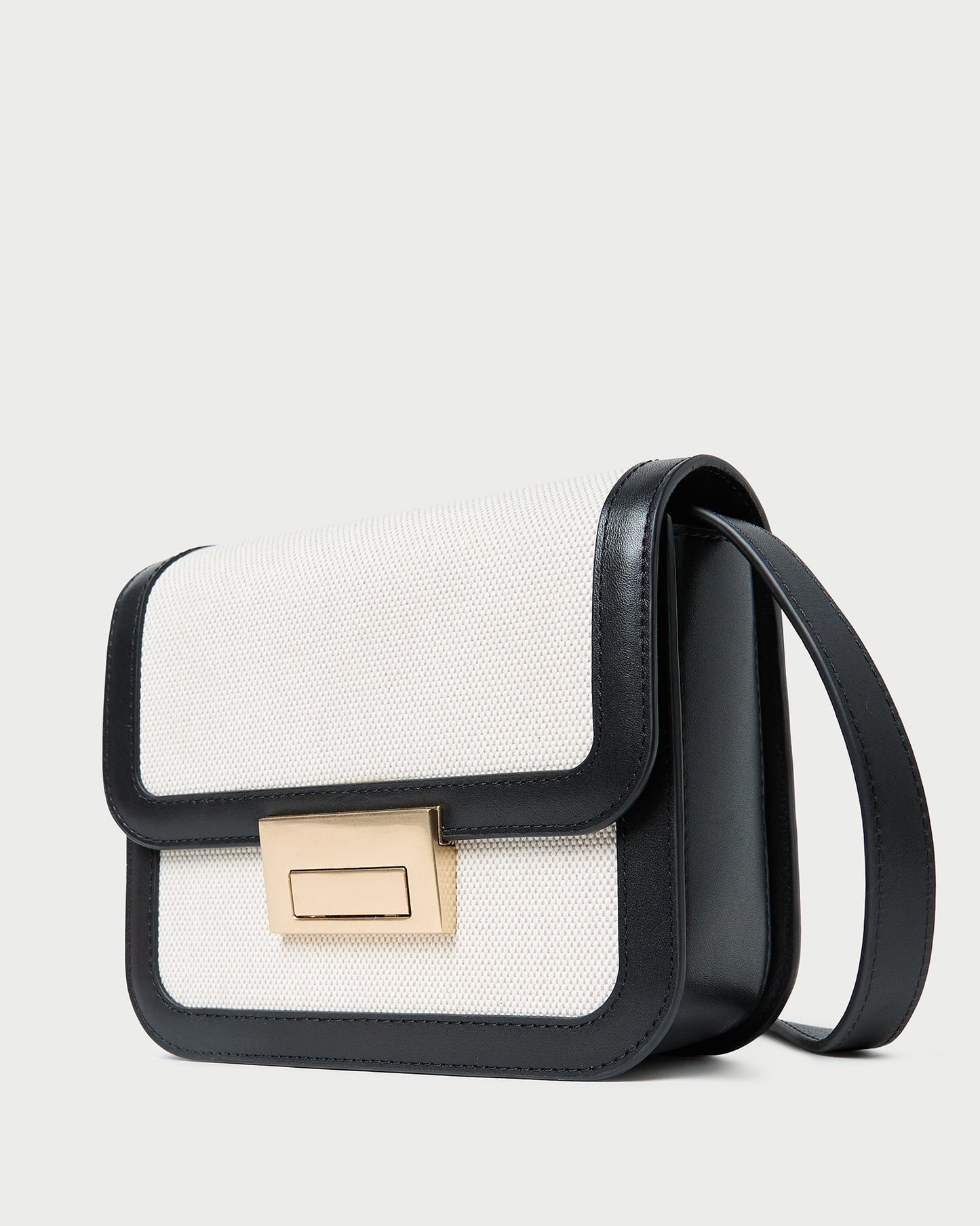 Sac bandoulière Desi en toile noire/naturelle