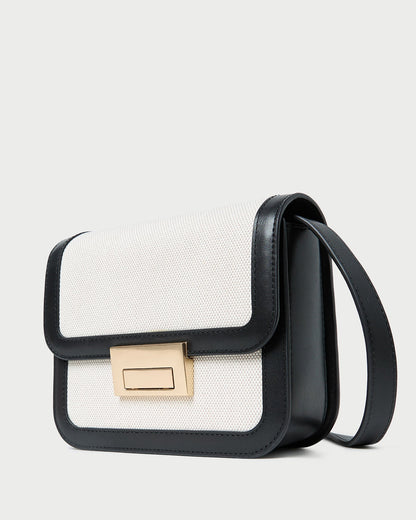 Sac bandoulière Desi en toile noire/naturelle