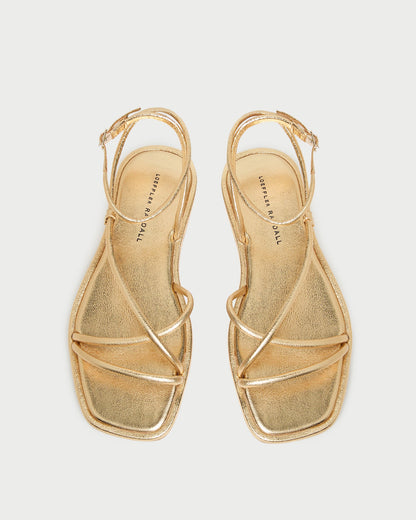 Sandale plate en cuir doré Noor